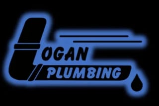 Hogan Plumbing neon sign with blue glowing wrench and water drop on black background